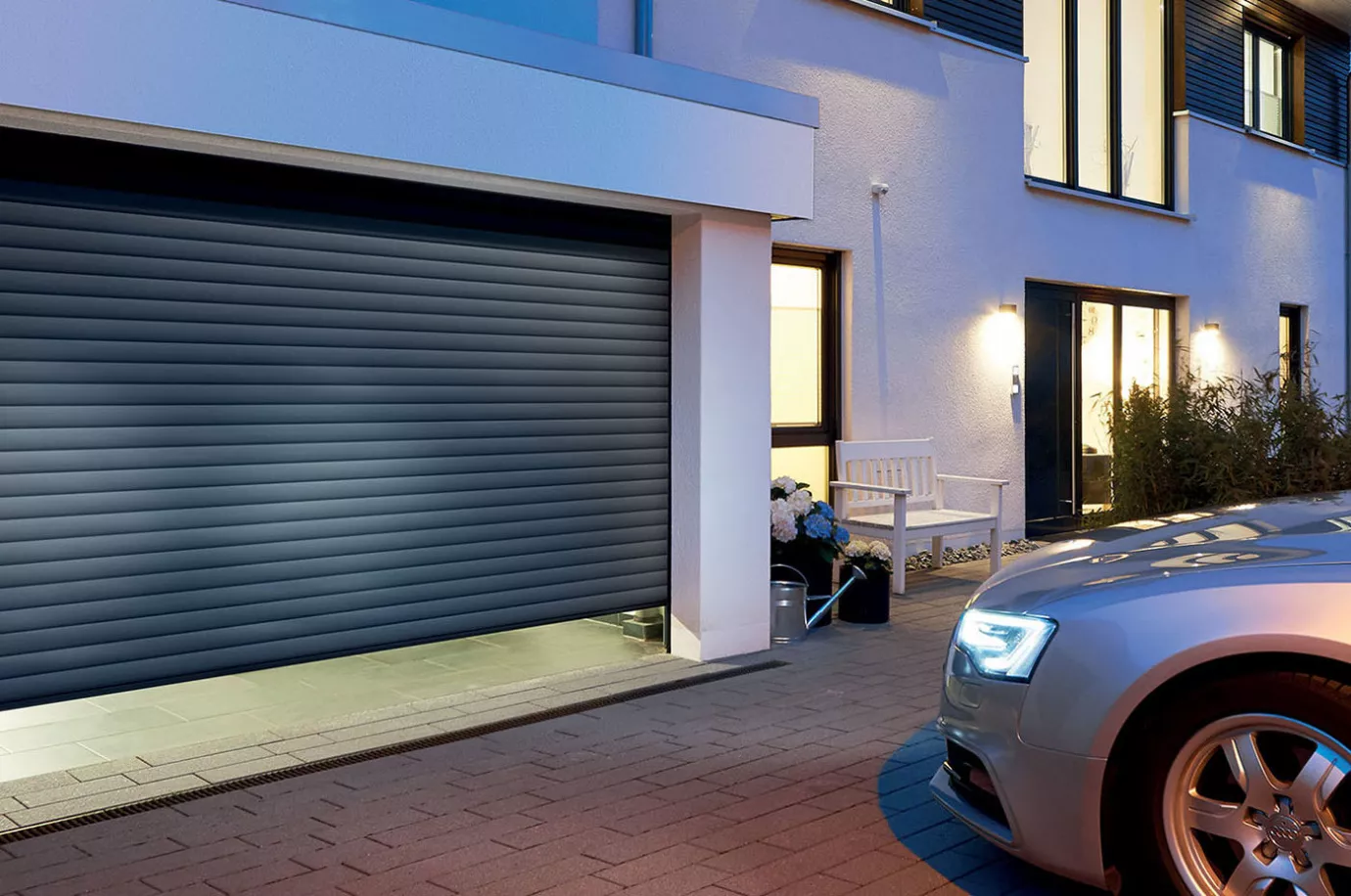 Какие ворота лучше - секционные или рулонные